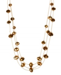 Use your illusion. This lengthy layered necklace from Kenneth Cole New York sports metallic cherry glass beads for a chic appearance. Crafted in gold tone mixed metal. Approximate length: 16 inches + 3-inch extender. Approximate drop: 1 inch.