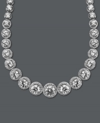 A chic collar perfect for cocktail hour. Arabella's dazzling design highlights dozens of round-cut Swarovski zirconias (55-1/3 ct. t.w.) set in sterling silver. Approximate length: 17 inches.