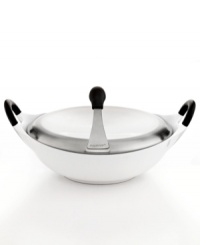 A new look. Give your kitchen a modern update with this incredibly light and sophisticated cast aluminum covered wok. Providing fast & even heat distribution, the sleek vessel features a phenolic resin stay-cool handle, easy-pour spout and a striking silhouette that creates an art show on the stovetop. 3-year warranty.