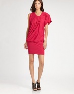 Soft, vibrant jersey, tailored in an asymmetrical silhouette with a flattering side drape.Banded jewel necklineSingle short sleeveFront and back pleatsAsymmetrical side drapeAbout 23 from natural waist68% acetate/27% polyester/5% spandexHand washMade in USA of imported fabricModel shown is 5'10 (177cm) wearing US size Small. 