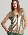 A sequin front lends chic luster to a classic Jones New York Collection cardigan for a luxe approach to layering.