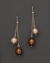 Richly hued champagne and chocolate pearls dangle from 14K. yellow gold chains.