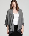 Crisp color blocking emboldens an effortless Eileen Fisher Plus cardigan for chic everyday style.