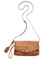 Shoulder this season's rocker-chic trend with this cool clutch from Frye. Soft antiqued leather, custom hardware and detail stitching add eye-catching detail, while the convenient crossbody strap makes it the perfect choice for everyday escapes.