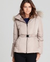 Touting a lush fur-trimmed hood and plush down filling, this Bloomingdale's Exclusive Gerard Darel coat lends sumptuous style to the season.