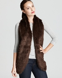 Embrace this season's flair for the exotic in a faux-fur Jones New York Collection vest. Slip on the sumptuous silhouette and take everyday staples to statement status.