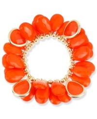 Bright colors make the season. Haskell's shaky bracelet combines teardrop-shaped orange acrylic beads with gold tone metal details. Set in gold tone mixed metal. Bracelet stretches to fit wrist. Approximate length: 7-1/2 inches.