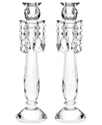 Truly stunning, Old Vienna candlesticks bring the opulence of ages past to today's most elegant interiors. A faceted crystal base and glistening crystal beads will become the focal point of any setting. From Lighting by Design.