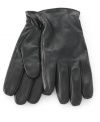 Get sleek style in a snap with these handsome leather gloves from Calvin Klein.