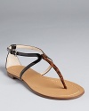 With glossy patent and animal-printed suede straps, the Boutique 9 Paulyne flat sandals are a mixed-material mastermind.