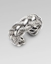 From the Woven Cable Collection. Bold and beautiful, textured and smooth cables intertwine elegantly in a wide sterling silver cuff. Sterling silver Diameter, about 2¼ Width, about 1 Imported