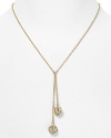 A simply styled link chain sets off a pair of crystal-bedecked tassels on this Lauren Ralph Lauren necklace, finished in plated metal.