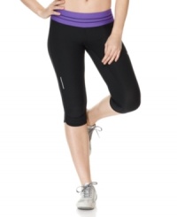 Make your workout a little easier with these clever capris from Nike.  Dri-FIT technology wicks moisture, a small storage pocket keeps your items safe and a reflective detail at the leg lends visibility.