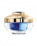 After seven years of intensive research, Guerlain discovered the secret to the orchid's longevity, the Orchidée Impériale molecular extract. Already working wonders on the face in the form of the ultra-luxurious cream and fluid, the timeless secret of the orchid is now captured in an extraordinary eye and lip cream. The protective and regenerative benefits of the extract restore firmness, suppleness, density and hydration to these particularly delicate areas.Orchidée Impériale Eye and Lip Cream targets under-eye puffiness and dark circles with autofocus reflectors that light up the eye area. A tightening agent creates an instant rested look around the eyes. Crow's-feet are immediately smoothed.