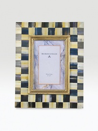 An elegant way to display a treasured photo, this hand-painted wood frame combines bold checks with hints of jewel-tone color and gilt inner molding.Hand-painted wood Glass Accommodates a 4 X 6 photograph Overall, 9 X 11 Cloth-covered easel and back Imported