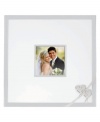 Treat a special couple to the True Love autograph frame. Interlocking hearts adorn this elegant, silver-plated showcase for a cherished wedding photo. A broad rim accommodates signatures from bridal shower or reception guests.