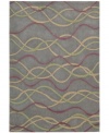 Graphic appeal: an abstract, wavy design flows across the silver field of Nourison's mesmerizing City Limits rug, giving any room a sense of urban-inspired chic. Hand-tufted of polyacrylic fibers, the rug is pleasingly soft, textured and easy to clean.