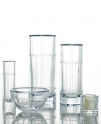 kate spade encourages you to read between the lines with the Madison Square cylinder bud vase. The deep cut, frosted geometric lines on clear crystal makes this collection a perfect companion to your Madison Square dinnerware. Shown left.