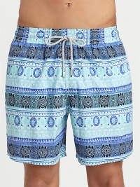 Woven swim trunk with drawstring, elastic waist and back eyelets to avoid ballooning, set in quick-drying nylon.Drawstring elastic waistSide slash, back flap pocketsPolyamideMachine washImported