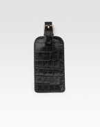 An elegant travel essential is handmade in croco-textured leather. Buckle closure 6¼ X 2½ Made in USA