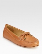 Vibrant leather and intricate stitching shape a classic moccasin design. Leather upperLeather lining and solePadded insoleOUR FIT MODEL RECOMMENDS ordering true whole size; ½ sizes should order the next whole size up. Additional Information Women's Shoe Size Guide (International Equivalents) 