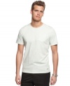 It's time to tee up this summer. Enhance your casual cool with this heathered shirt from Calvin Klein.