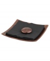 A sophisticated way to offer napkins to your guests. Crafted of alloy and finished in beautiful bronze, this Heritage pebble napkin holder serving set from Nambe's collection of serveware combines old-world elegance with a chic, modern shape.