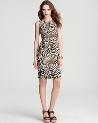 Polished enough for the office yet daring enough for after-dark, embrace your fashion fierceness in this Anne Klein Dress animal-print sheath.