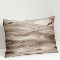 Inspired by the wild game of Africa, but reinterpreted in a watercolor abstracted way in bronze, taupe and earth colors on sateen. Duvet has hidden button closure. Duvets, shams and comforters are self-reversing.