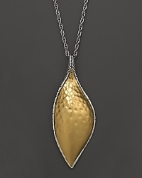 A shimmering leaf of textured 22K gold and sterling silver from the Palu collection by John Hardy.