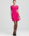 In a hot pink hue, this standout DKNY dress (crafted in crepe de chine) lends brilliantly bright style.