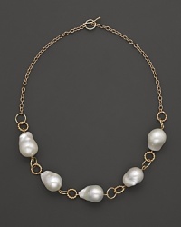 Boldly gleaming baroque freshwater pearls add rich luster to 14K yellow gold. By Nancy B.