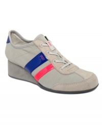 Look lovely and trendy in DKNY Women's Raina wedge sneakers. With a few brightly-colored straps and a wedge heel, this is the style for you.