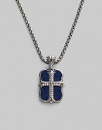 An original design pairs two sterling silver pendants on a single strand. The cross pendant is crafted with pavé diamond detail, and the larger features smooth lapis inlay. Sterling silver Pavé diamonds Lapis Pendant: 1 long Necklace: 24 long Lobster clasp closure Imported 