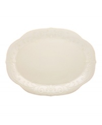 With fanciful beading and a feminine edge, this plater from the Lenox French Perle white dinnerware collection has an irresistibly old-fashioned sensibility. Hard-wearing stoneware is dishwasher safe and, in a soft white hue with antiqued trim, a graceful addition to every meal.