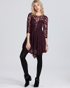 Enmesh yourself in boho glamour with a Free People dress. A draped skirt and elegant lace are fancy without the fuss.