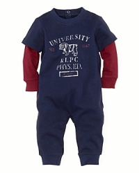 A preppy coverall in soft cotton jersey features sporty verbiage.