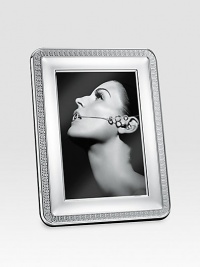 Elegantly appointed, polished silverplated design gives proper attention to a favorite photograph. From the Malmaison Collection A terrific gift idea Wood base Made in FranceDIMENSION INFORMATION4 X 6 (5 X 7 overall)5 X 7 (6 X 8 overall)