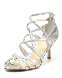 Metallic silver leather gives a sparkling finish to a glamourous sandal from IVANKA TRUMP.