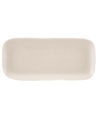 Find stylish versatility in the organic shape and matte-glazed finish of the Casual Luxe hors d'oeuvres tray from Donna Karan by Lenox. Durable stoneware in a soft pearl hue is an ideal host for everyday meals and a natural go-to for entertaining.