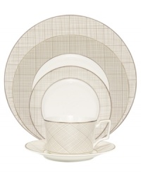 Dressed in a fine diamond grid of bronze and warm taupe, these mugs are from Noritake dinnerware. The dishes are tailored for formal dining and everyday elegance in bone china. Not shown.