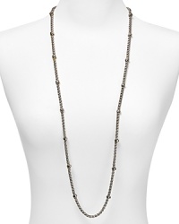 Finish off every look with this elegant rounded chain necklace crafted in shiny silver tone and finished with delicate stations. From Lauren Ralph Lauren.