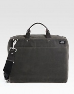 An updated classic with metropolitan style, crafted in sleek and sturdy waxed cotton with leather details.Zip closureTop handlesAdjustable shoulder strapExterior, interior zip pocketOrganizing pocketsFully lined12W x 16H x 3DImported