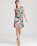 A breezy silhouette lends movement to vibrant florals for a Lilly Pulitzer dress blooming with feminine charm. Complement the bouquet of hues with color-pop pumps.