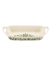 Pretty for serving hot cinnamon rolls, gingerbread and other holiday baked goods, this porcelain bread basket from Lenox's collection of serveware and serving dishes has rope trim and a holly motif to match the beloved Holiday dinnerware line.