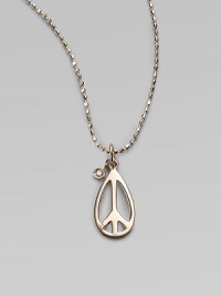 A message of peace, sleekly sculpted in 14k gold with a diamond accent, suspended on a gold oval ball chain. Diamond, 0.01 tcw 14k yellow gold Chain length, about 16 Pendant length, about ½ Lobster clasp Imported