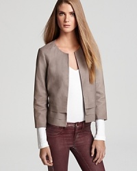 A stylish, cropped silhouette and layered hem lends a refined and feminine look to this leather Joie jacket--our top pick for layer-perfect luxe this fall.