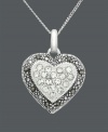 Say it from the heart, Genevieve & Grace's exquisite heart pendant makes the perfect gift for the one you adore. Crafted in sterling silver with sparkling, round-cut crystals and marcasite edges. Approximate length: 18 inches. Approximate drop: 1 inch.