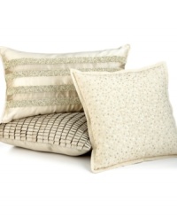 An allover embroidered confetti pattern embellishes this decorative pillow from Hotel Collection for a luxurious appeal.