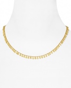 Turn up the volume on your neckline with this delicate gold necklace from Melinda Maria, trimmed in delicate gold pod beads.